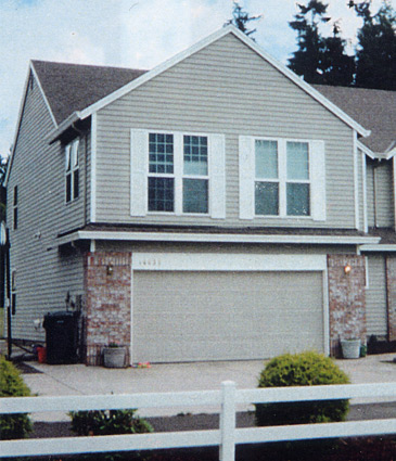 Garage exterior after second story added.