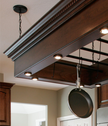 Close up of pan rack in remodeled kitchen