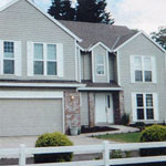 Exterior of second story addition project showing how seamlessly addition blends in with the rest of the house.